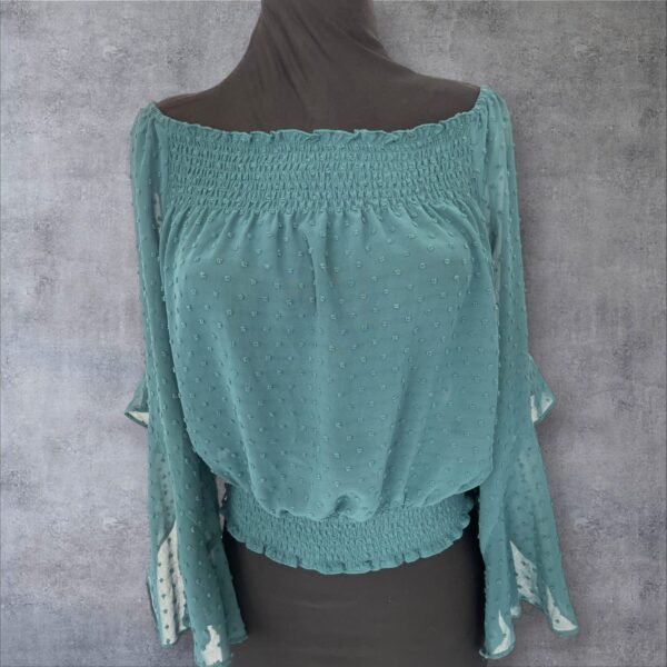 r-9-1 Blusa. H&M. Talla 12.